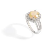 An opal and diamond set cluster ring