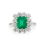 A Colombian emerald and diamond set cluster ring