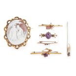 A collection of brooches