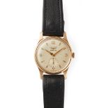 Longines: a gentleman's gold wrist watch