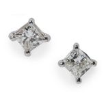 A pair of diamond stud earrings