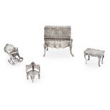 A collection of Dutch miniature furniture