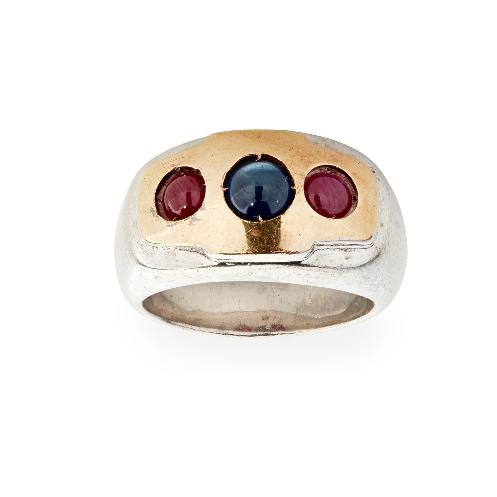 A sapphire and ruby set three stone ring