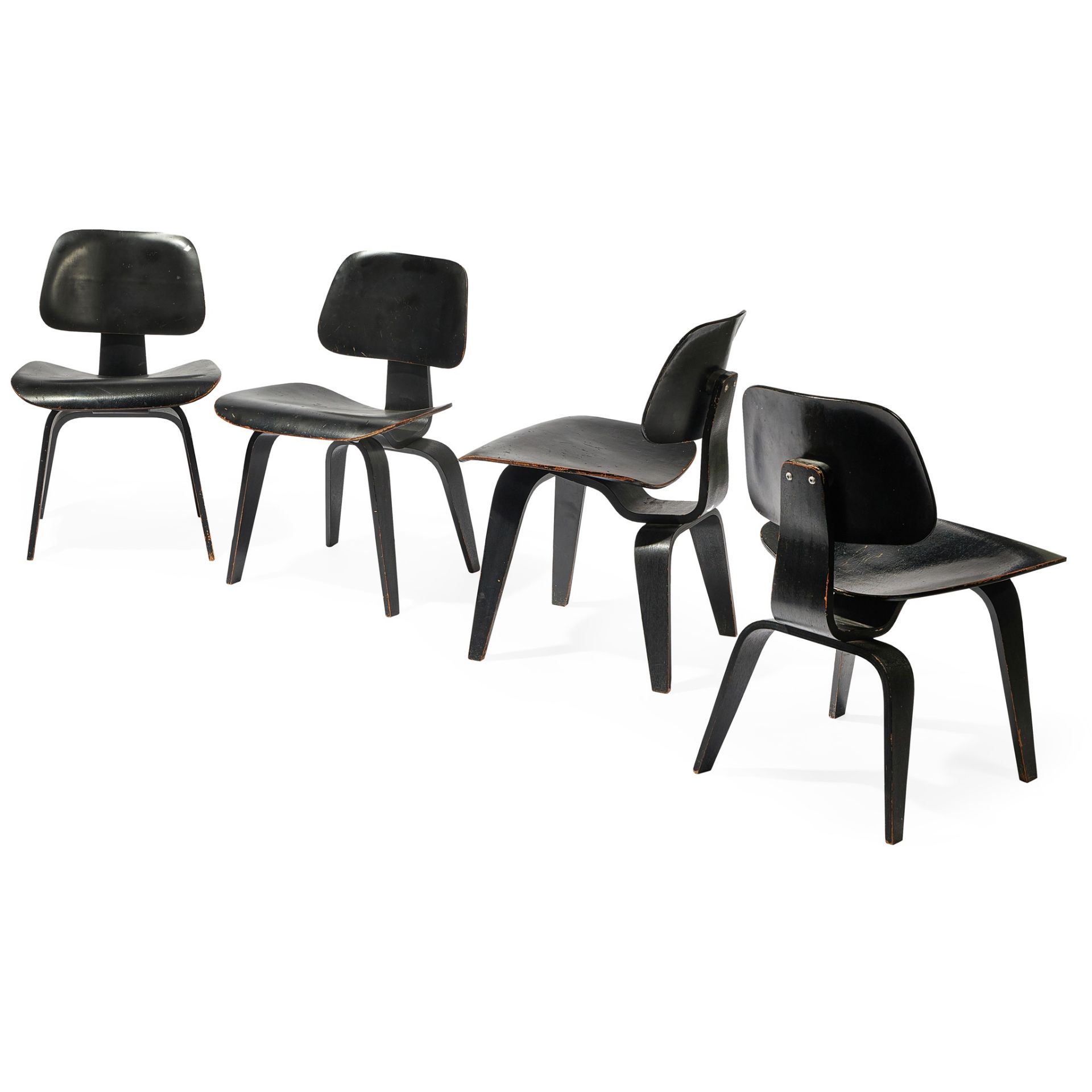 CHARLES AND RAY EAMES (AMERICAN, 1907-1978, 1912-1988) FOR EVANS SET OF FOUR DCW CHAIRS