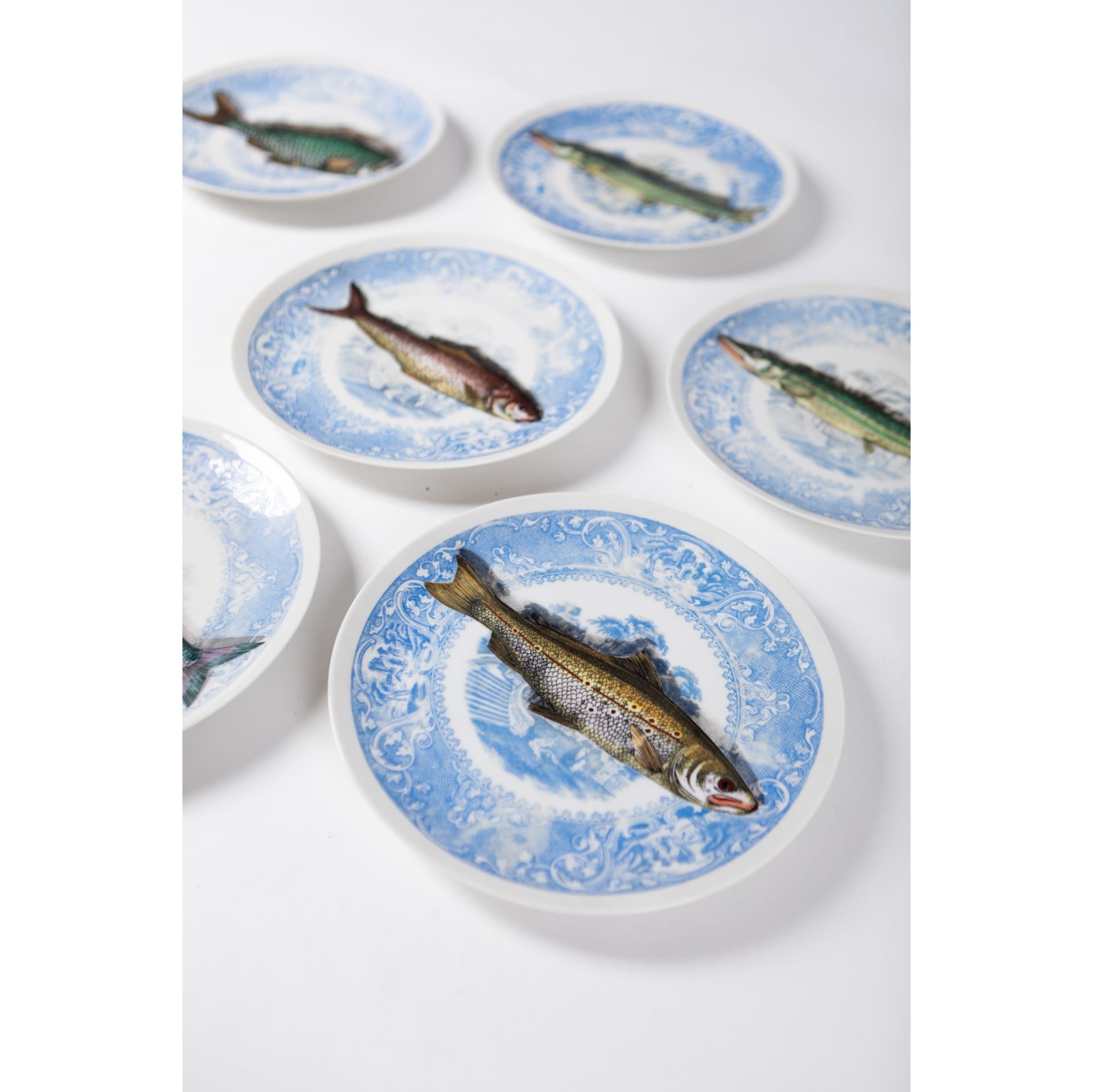 PIERO FORNASETTI (ITALIAN 1913-1988) SET OF SIX 'PISCIBUS' TROMPE L'OEIL PLATES - Image 2 of 3