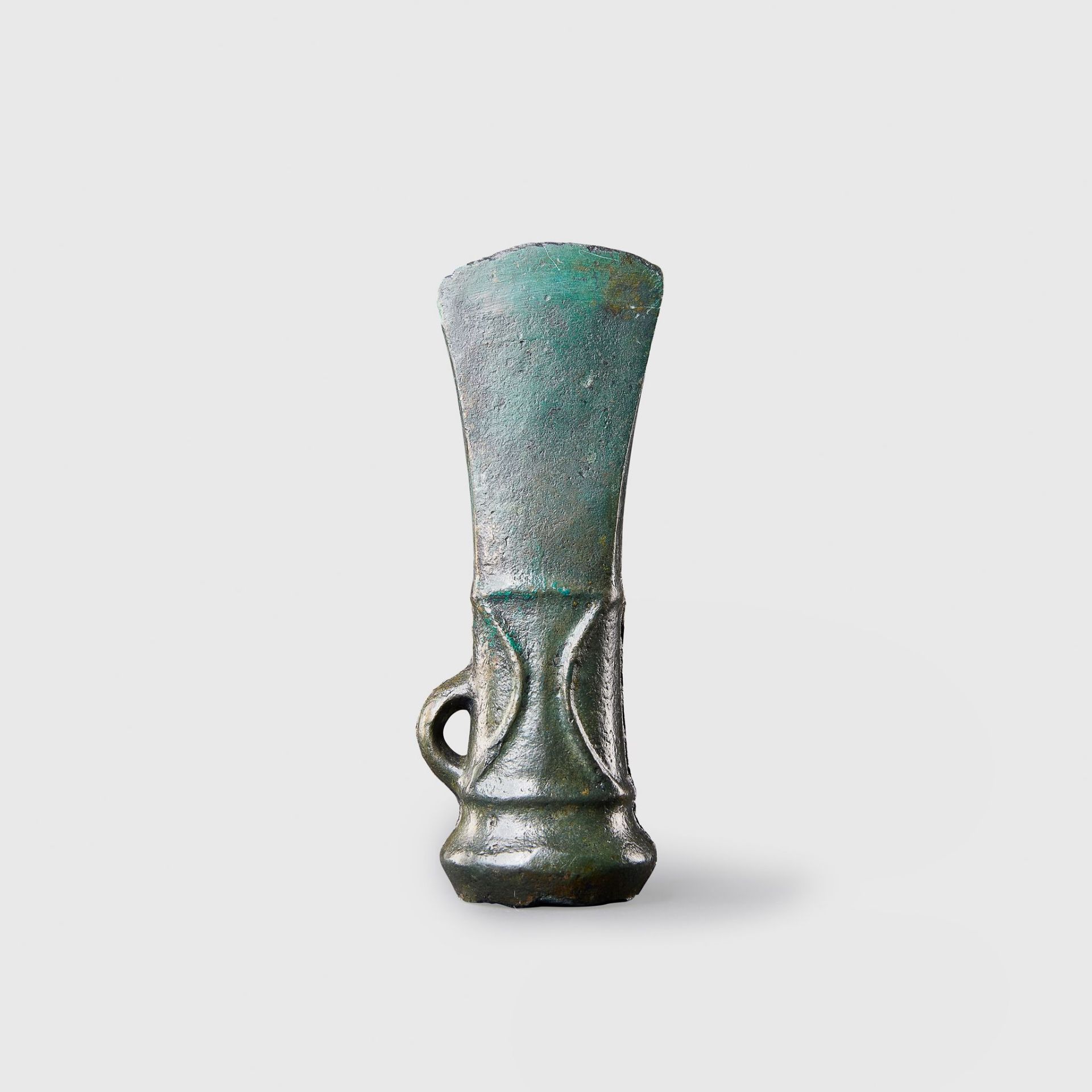 EARLY IRON AGE SOCKETED AXE HEAD UNITED KINGDOM, 7TH CENTURY B.C.