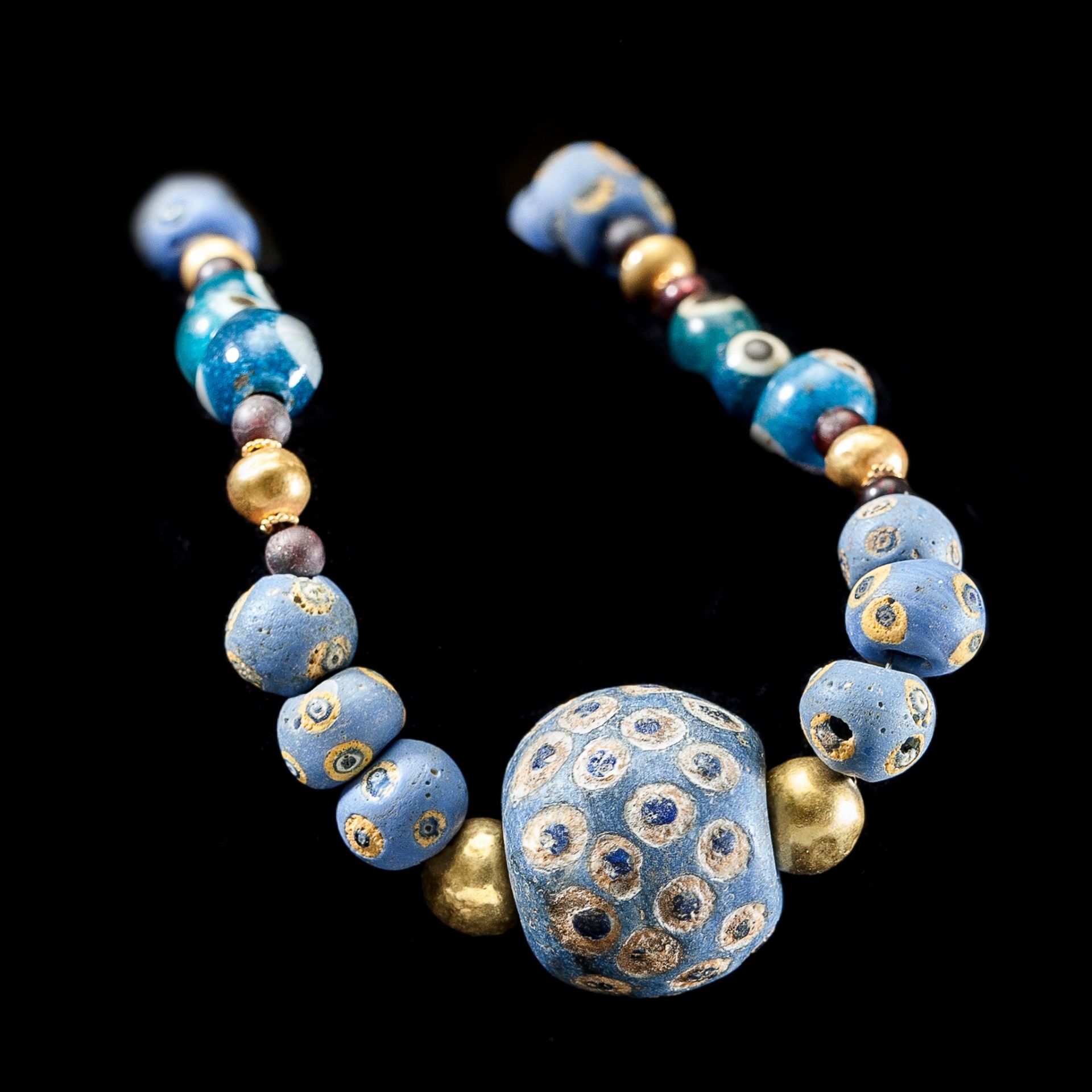 PHOENICIAN EYE GLASS AND GOLD BEAD NECKLACE NEAR EAST, C. 7TH CENTURY B.C. - Image 2 of 2