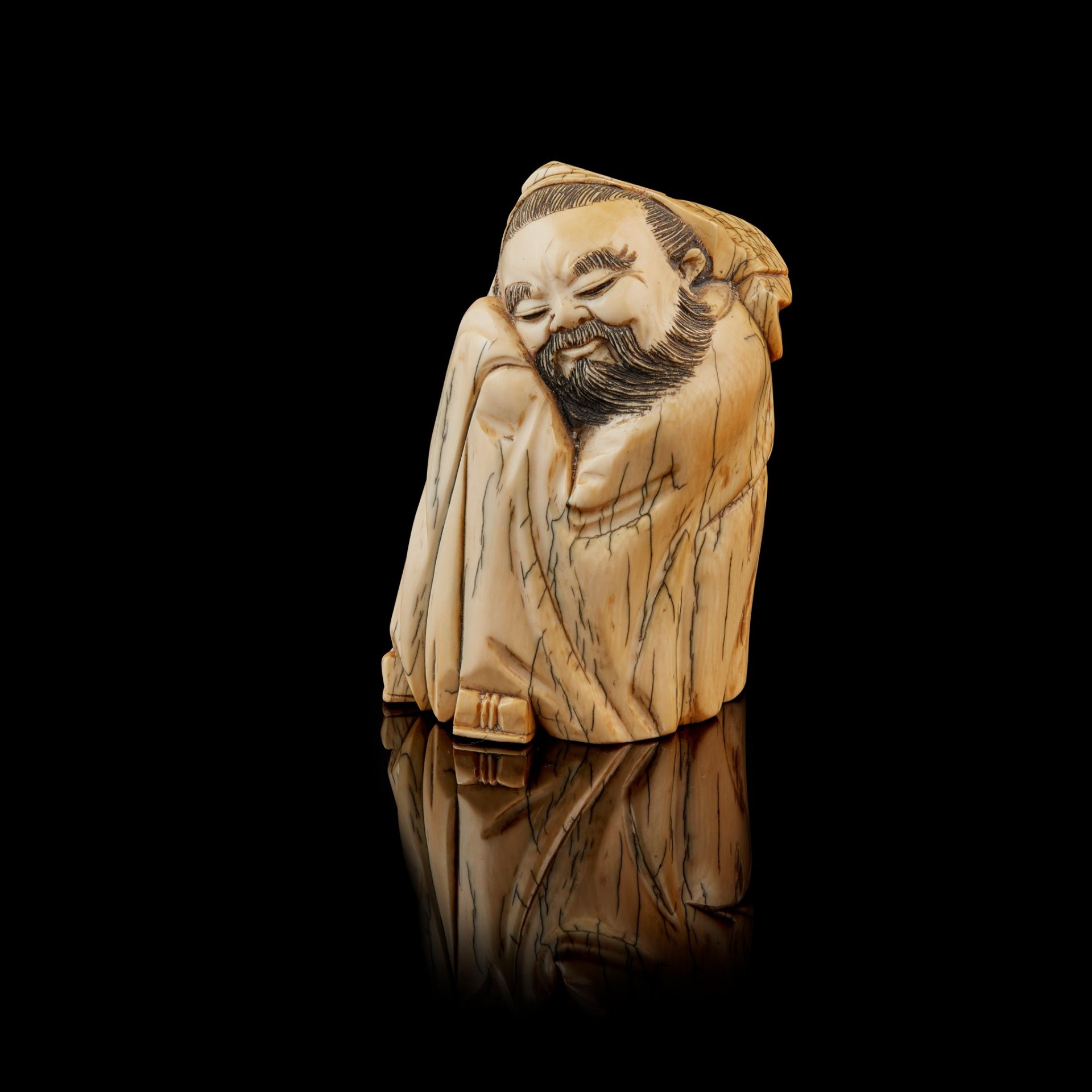 Y IVORY CARVING OF A NAPPING SCHOLAR MING TO QING DYNASTY, 17TH-18TH CENTURY