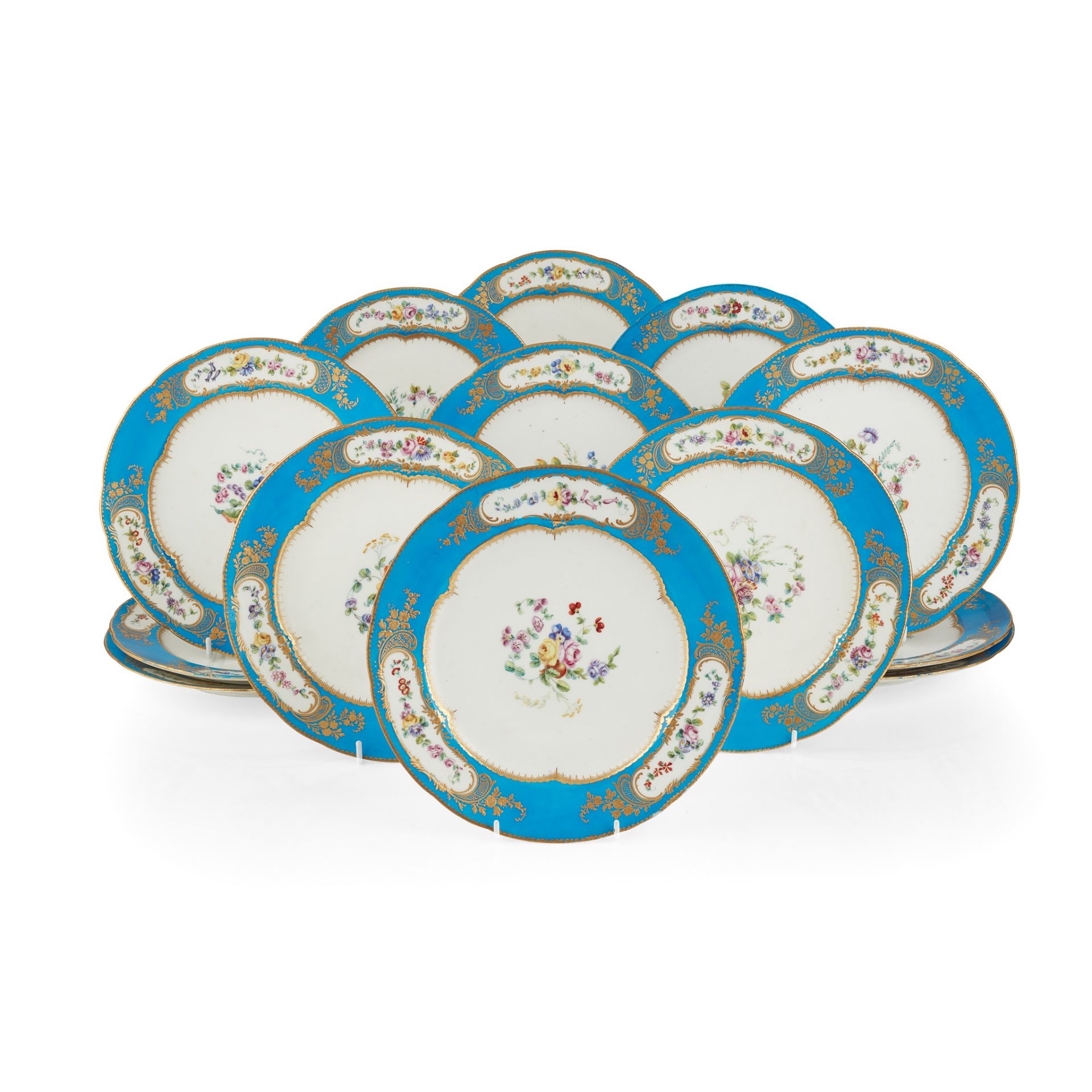 THIRTEEN SÈVRES STYLE BLEU CELESTE GROUND PORCELAIN PLATES 18TH CENTURY, LATER DECORATED