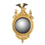 REGENCY GILTWOOD AND EBONISED CONVEX MIRROR EARLY 19TH CENTURY