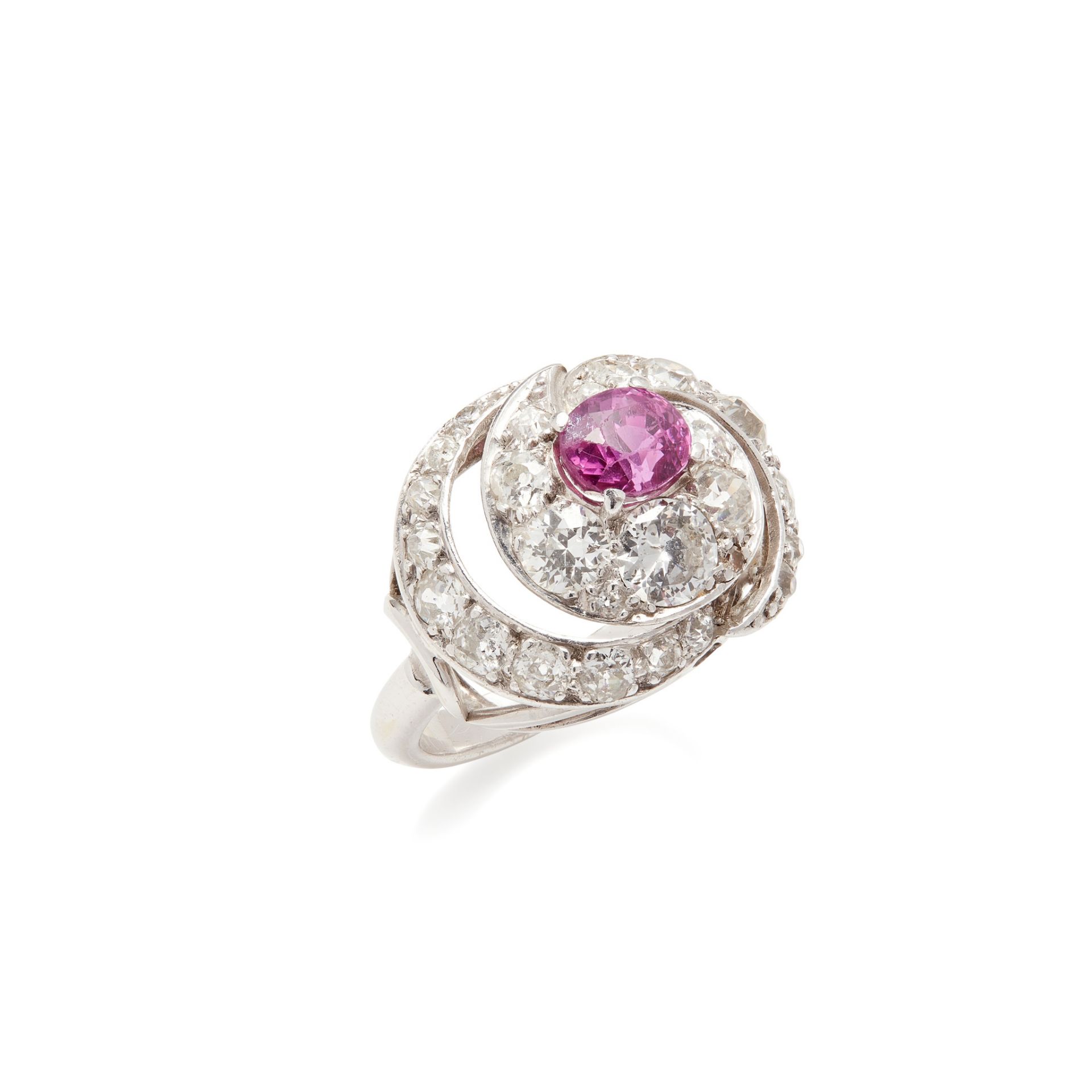 A pink sapphire and diamond set ring