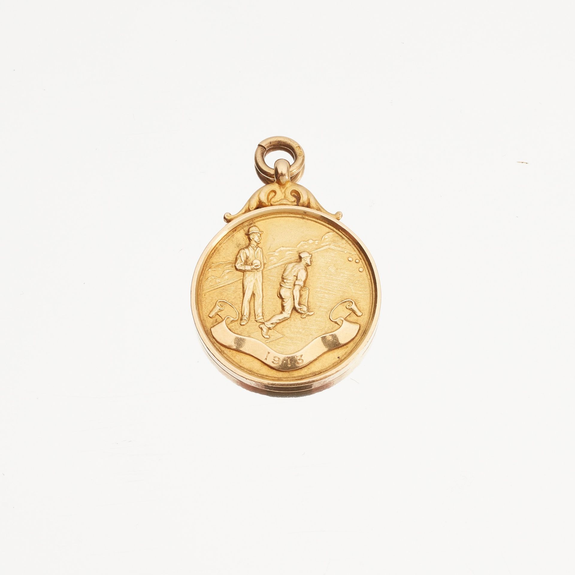 An 18ct gold Bowling Medal