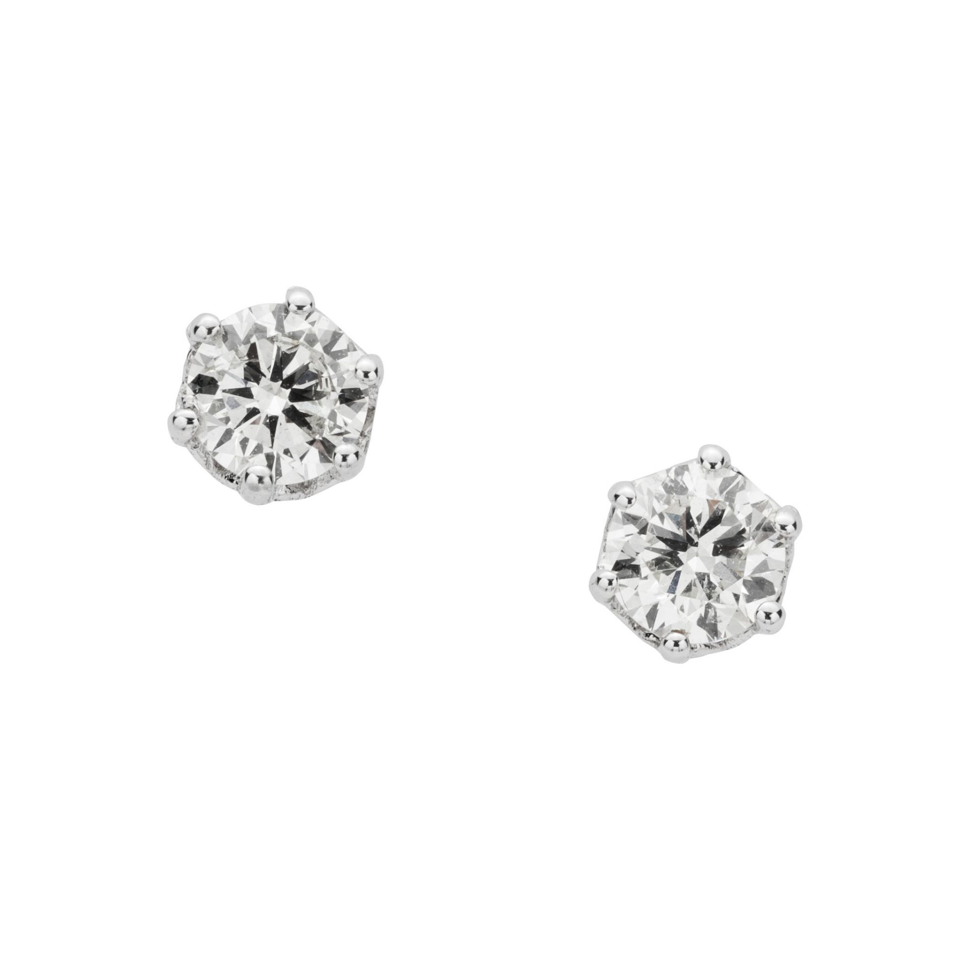 A pair of diamond single-stone earrings Each brilliant-cut diamond in a six-claw mount, screw-back