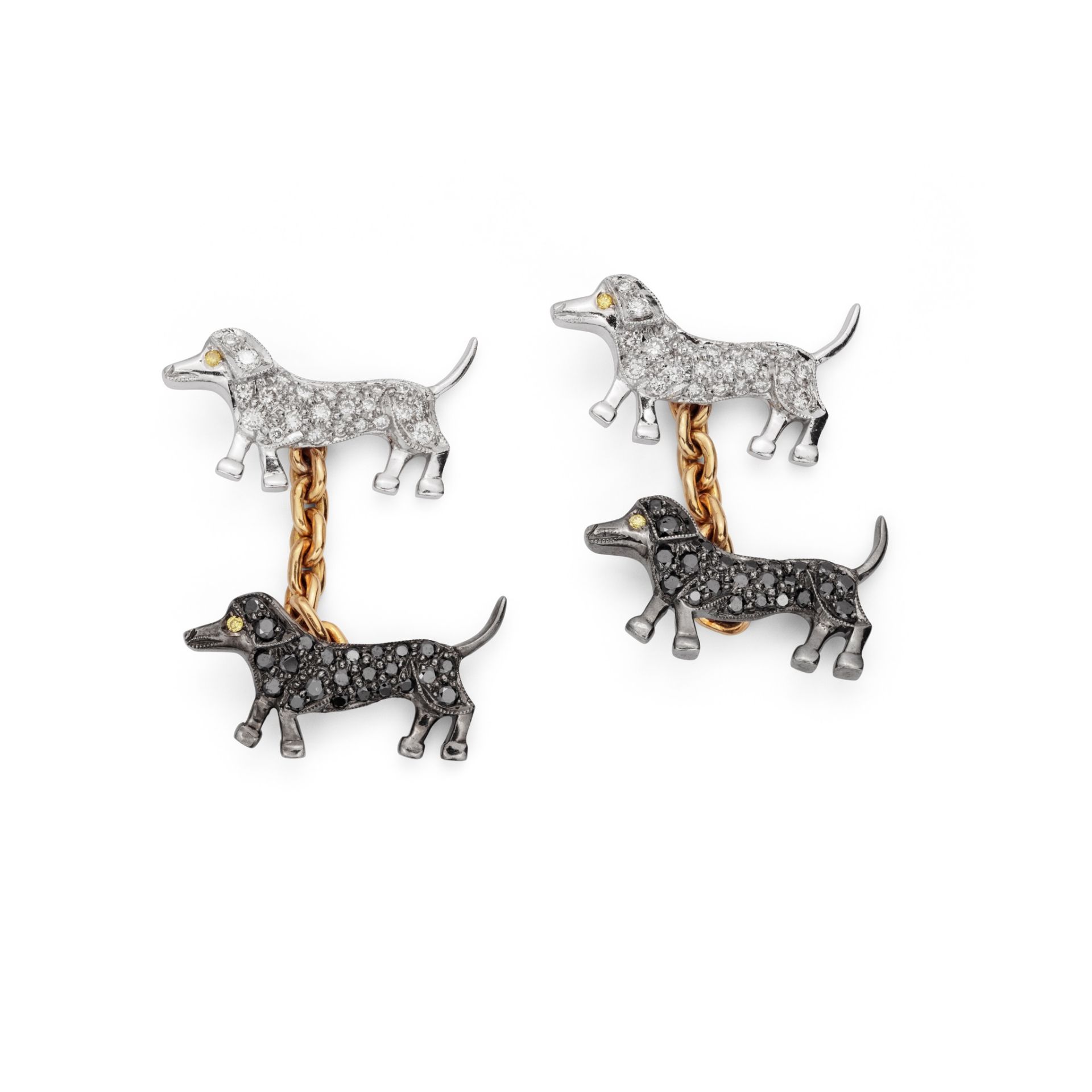 A pair of diamond-set novelty cufflinks Double-sided: Each terminal designed as a dachshund, pavé-