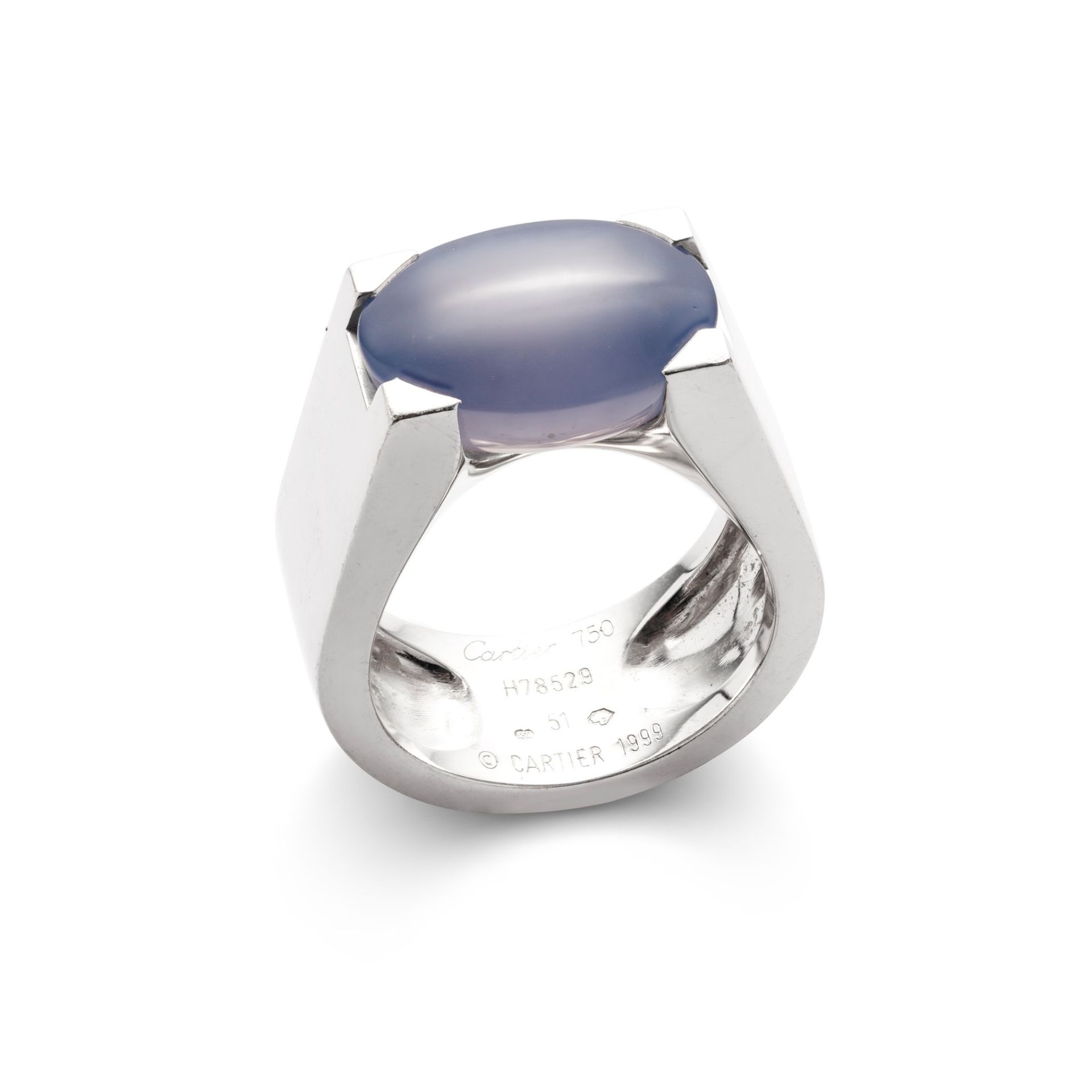 A chalcedony 'Tankissime' ring, by Cartier The oval-shaped blue chalcedony, to a wide polished