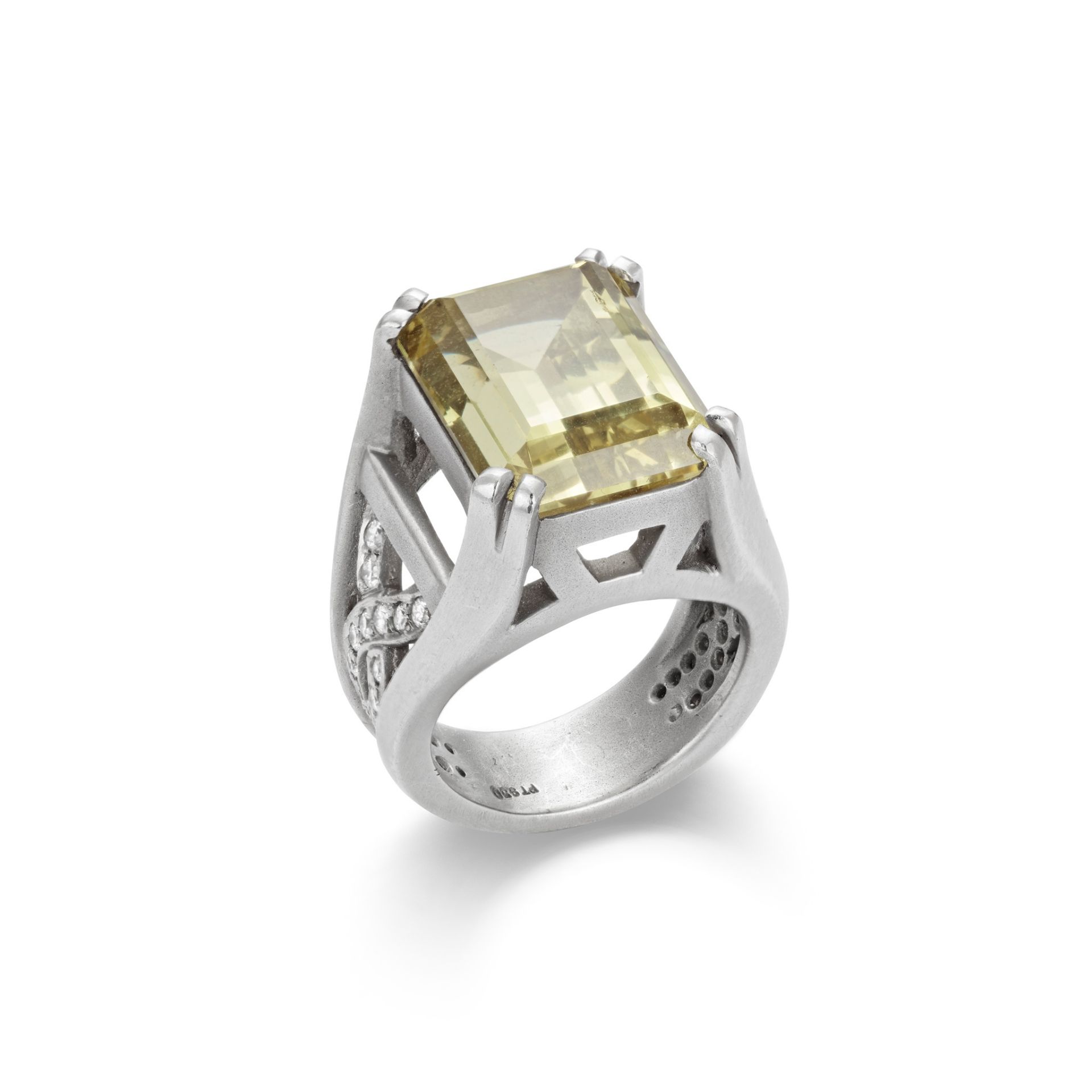 A beryl and diamond set platinum ring, by Barry Kieselstein-Cord The cut-cornered rectangular-cut