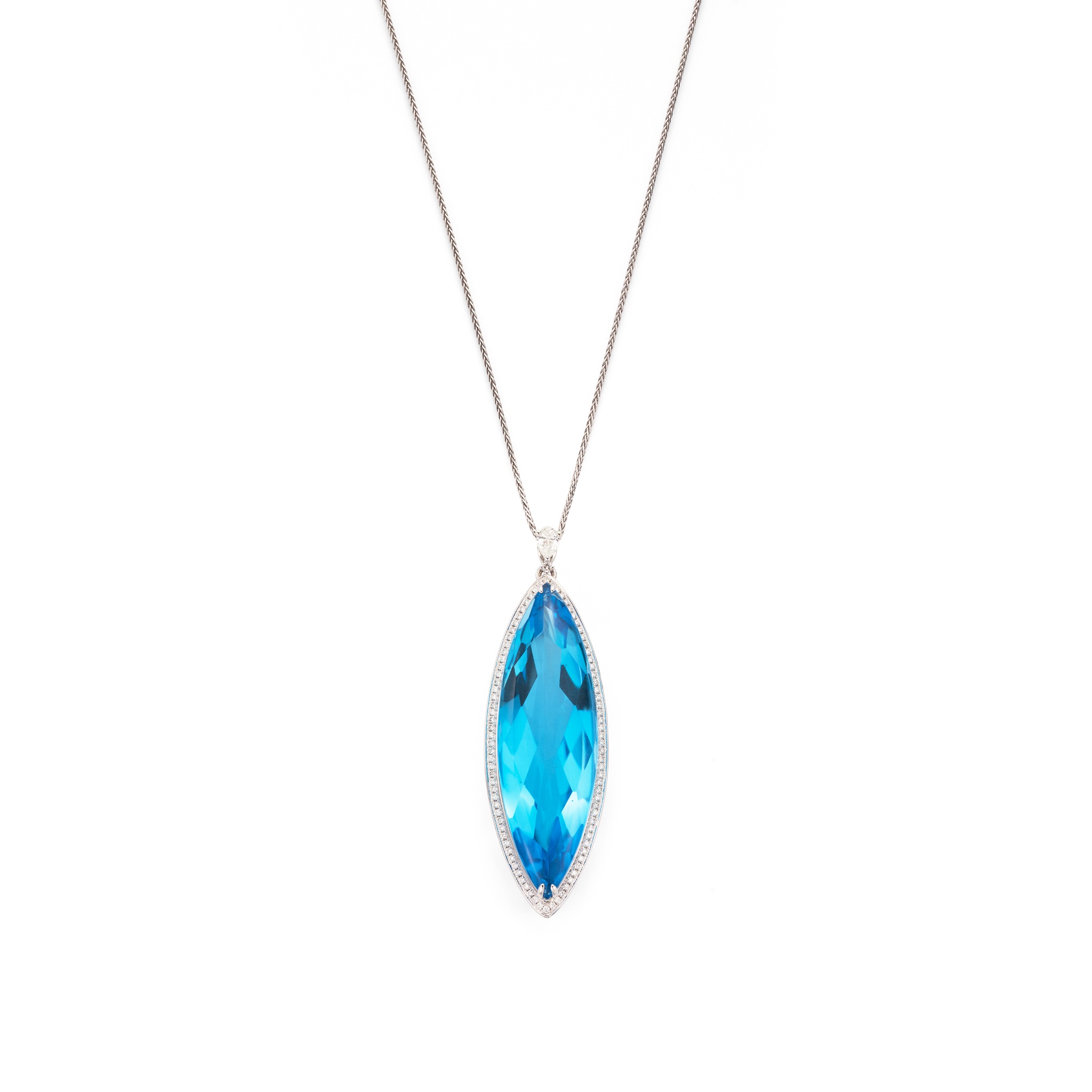 A blue topaz and diamond pendant The marquise-shaped fancy-cut blue topaz within a brilliant-cut