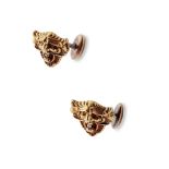 A pair of Art Nouveau diamond-set cufflinks Each designed as a grotesque mask with an old