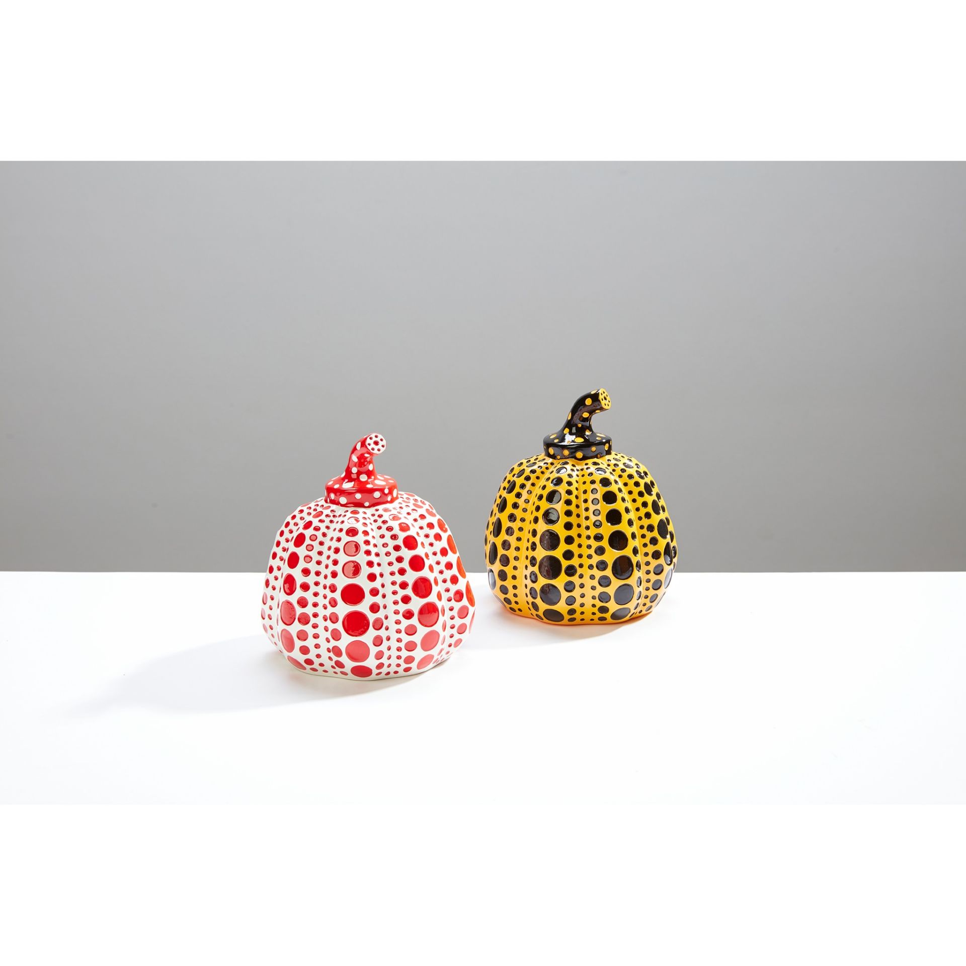 YAYOI KUSAMA (JAPANESE 1929-) PUMPKINS (YELLOW/BLACK AND RED/WHITE)