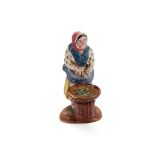 A SCOTTISH EAST COAST POTTERY NEWHAVEN FISHWIFE FIGURE EARLY 19TH CENTURY