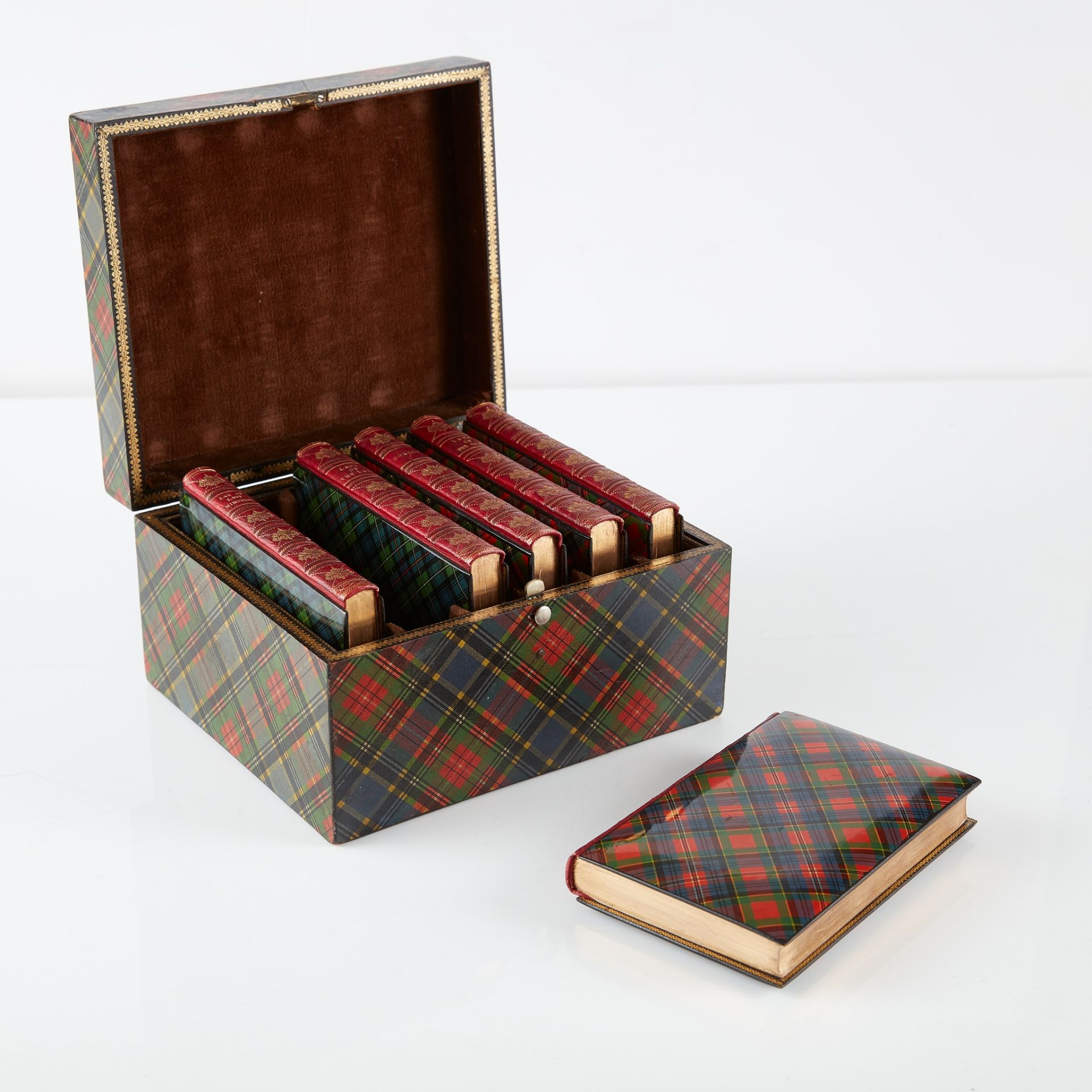 A MAUCHLINE 'TARTAN WARE' BOOK BOX, WITH VOLUMES BY SIR WALTER SCOTT
