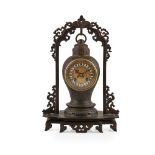 FRENCH JAPONISME PATINATED AND PARCEL GILT WHITE METAL MANTEL CLOCK 19TH CENTURY