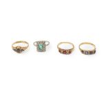 A collection of four gem-set rings