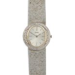 Piaget: a lady's diamond set watch