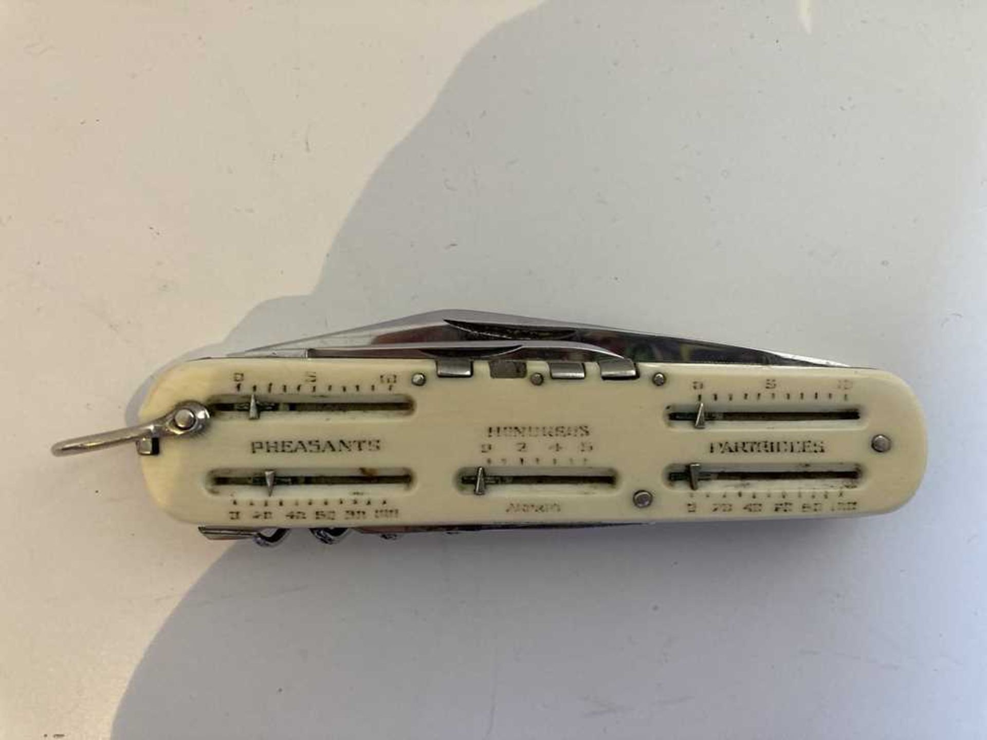 A 1920s ivory pen knife/ game counter, Asprey - Image 14 of 16