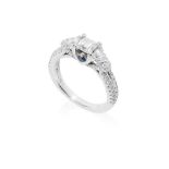 A three-stone diamond ring, by Vera Wang