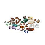 A collection of loose gemstones and agates