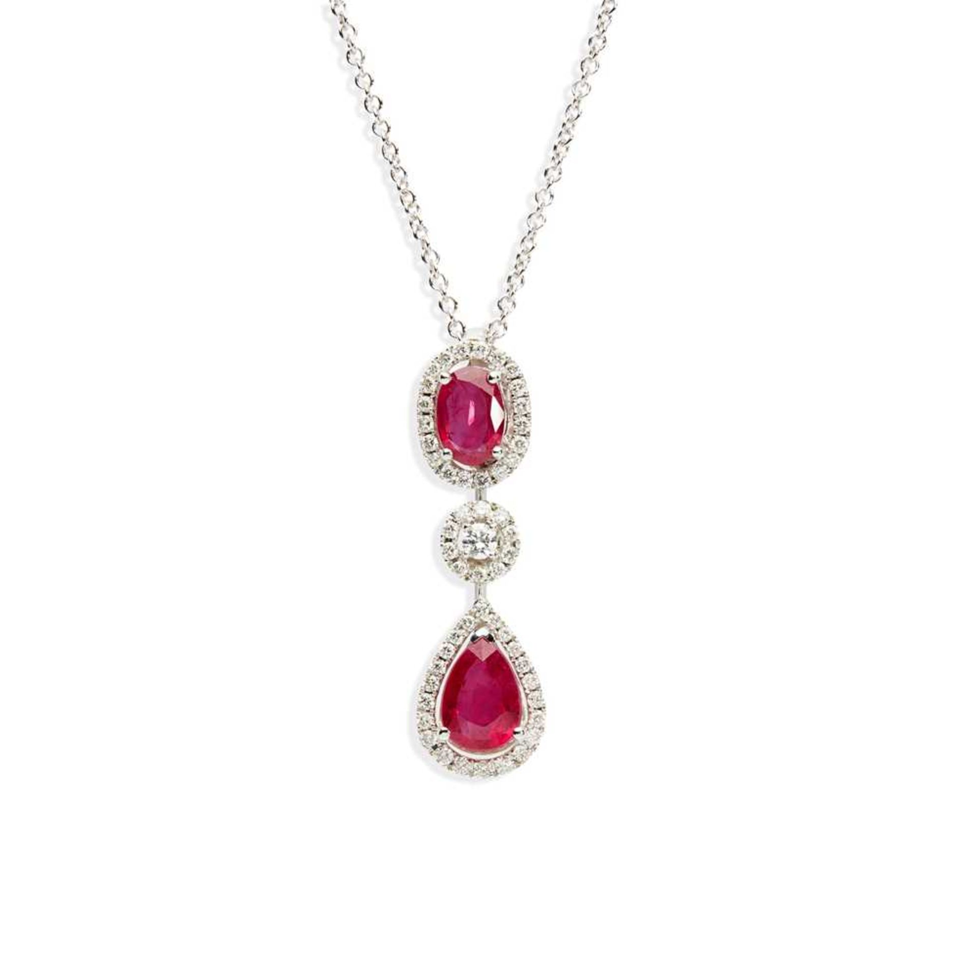 An 18ct white gold ruby and diamond pendant, by Mappin & Webb