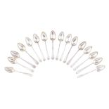 A matched set of dessert spoons