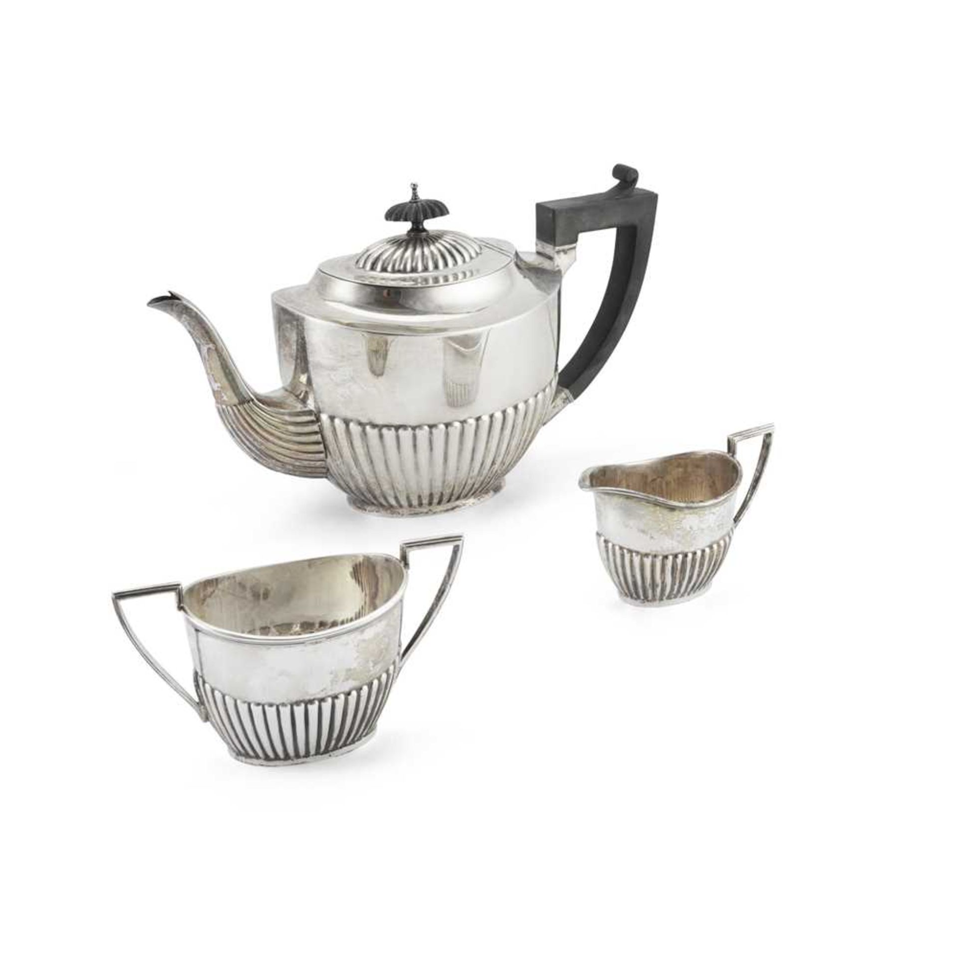 A mid 20th century composite three-piece tea service