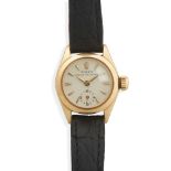 Rolex: a lady's gold wrist watch