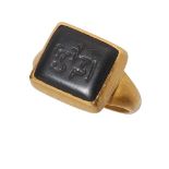 An onyx intaglio ring