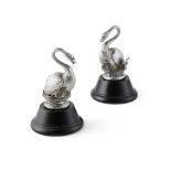 A pair of matched George III silver gilt swan finials