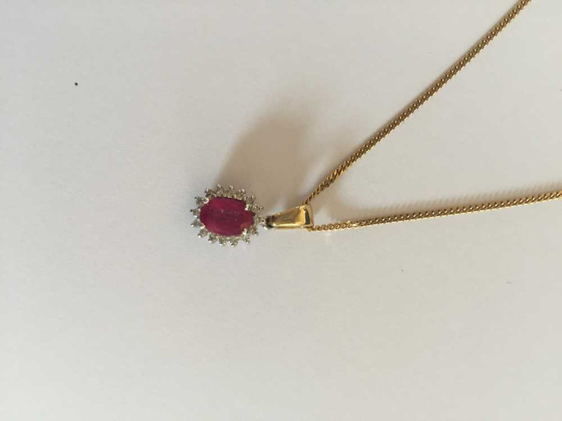 A pink sapphire and diamond pendant necklace - Image 3 of 17