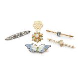 A collection of brooches