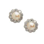 A pair of pearl and diamond cluster earrings