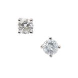 A pair of diamond stud earrings