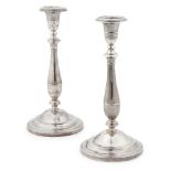 A pair of George III table candlesticks