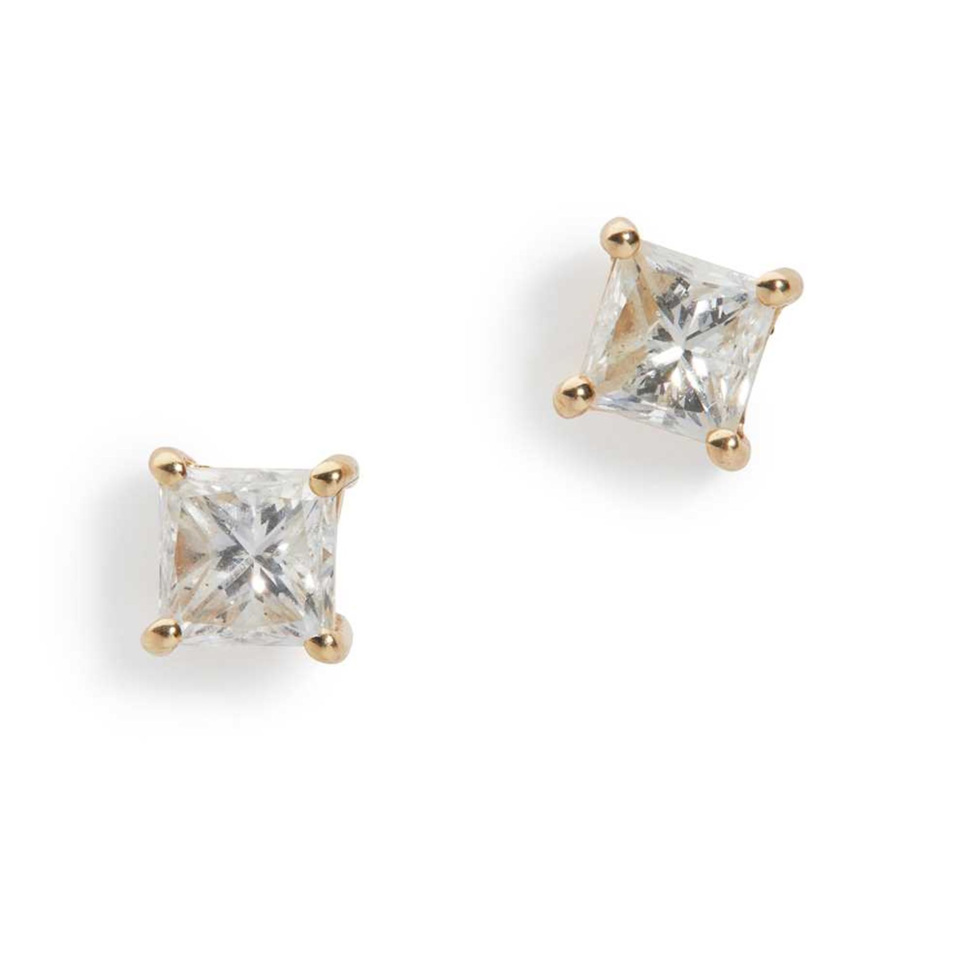 A pair of diamond stud earrings