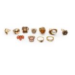 A collection of eleven gold and gem-set rings