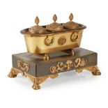 A LATE REGENCY GILT AND PATINATED BRONZE DESK STAND EARLY 19TH CENTURY