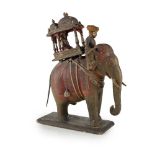 AN INDIAN CARVED AND PAINTED WOOD AND GESSO MODEL OF AN ELEPHANT AND HOWDAH 19TH CENTURY