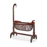 A FRENCH EMPIRE STYLE MAHOGANY CRIB MID 19TH CENTURY