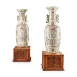 A PAIR OF MONUMENTAL CANTONESE FAMILLE ROSE PORCELAIN FLOOR VASES QING DYNASTY, EARLY 19TH CENTURY