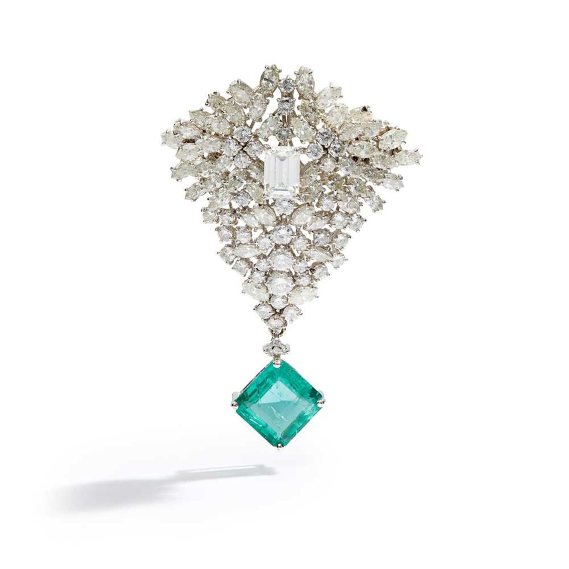 An emerald and diamond brooch