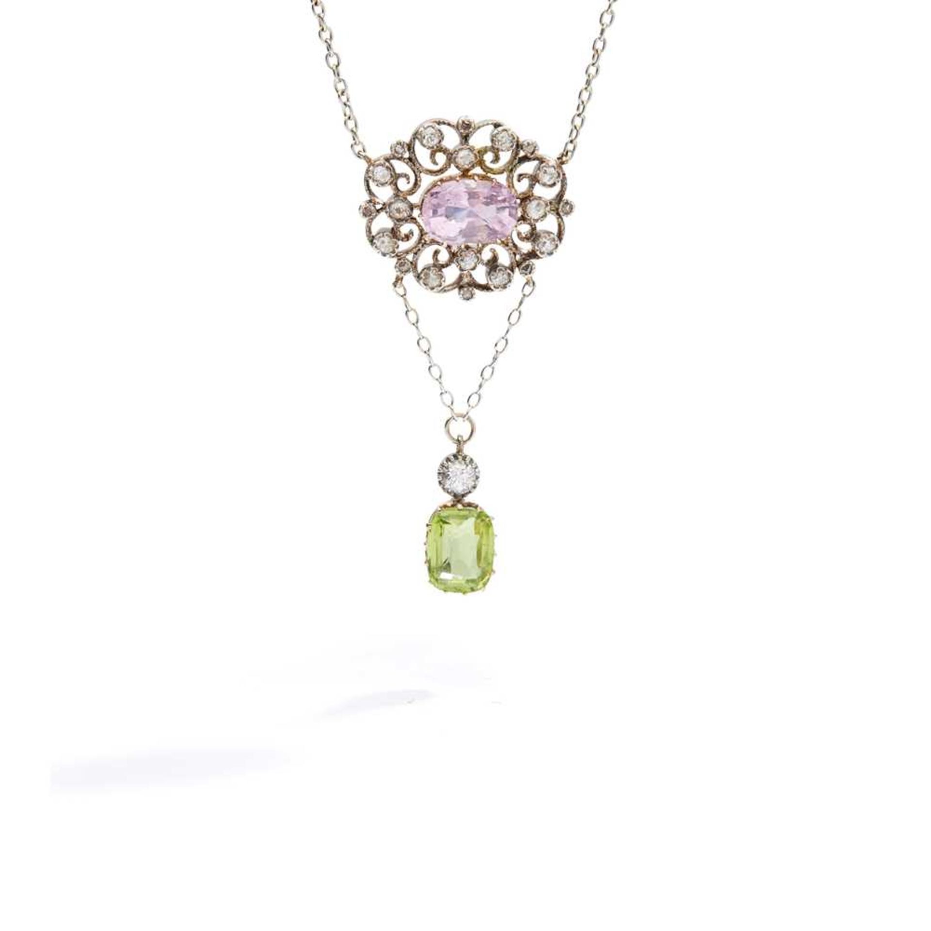 An early 20th century pink sapphire, diamond and peridot pendant, circa 1910